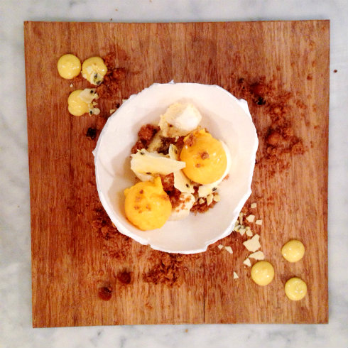 Meringue egg shell, mango sorbet, granadilla curd, toasted hazelnut crumbs. Delightful.