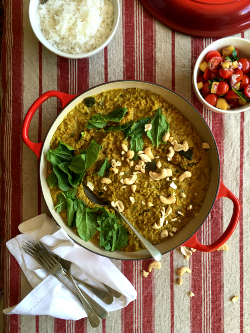 A hearty pot of dhal coconut curry with aubergine, spinach and cashews - rich and fragrant.