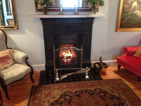 A cosy fireplace in the tea room.