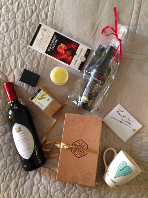 My gift hamper from Miles for Style included silver jewelry, wine, bee balm, chocolate, olive oil, hand crafted soap, a coffee mug and a leather wallet!